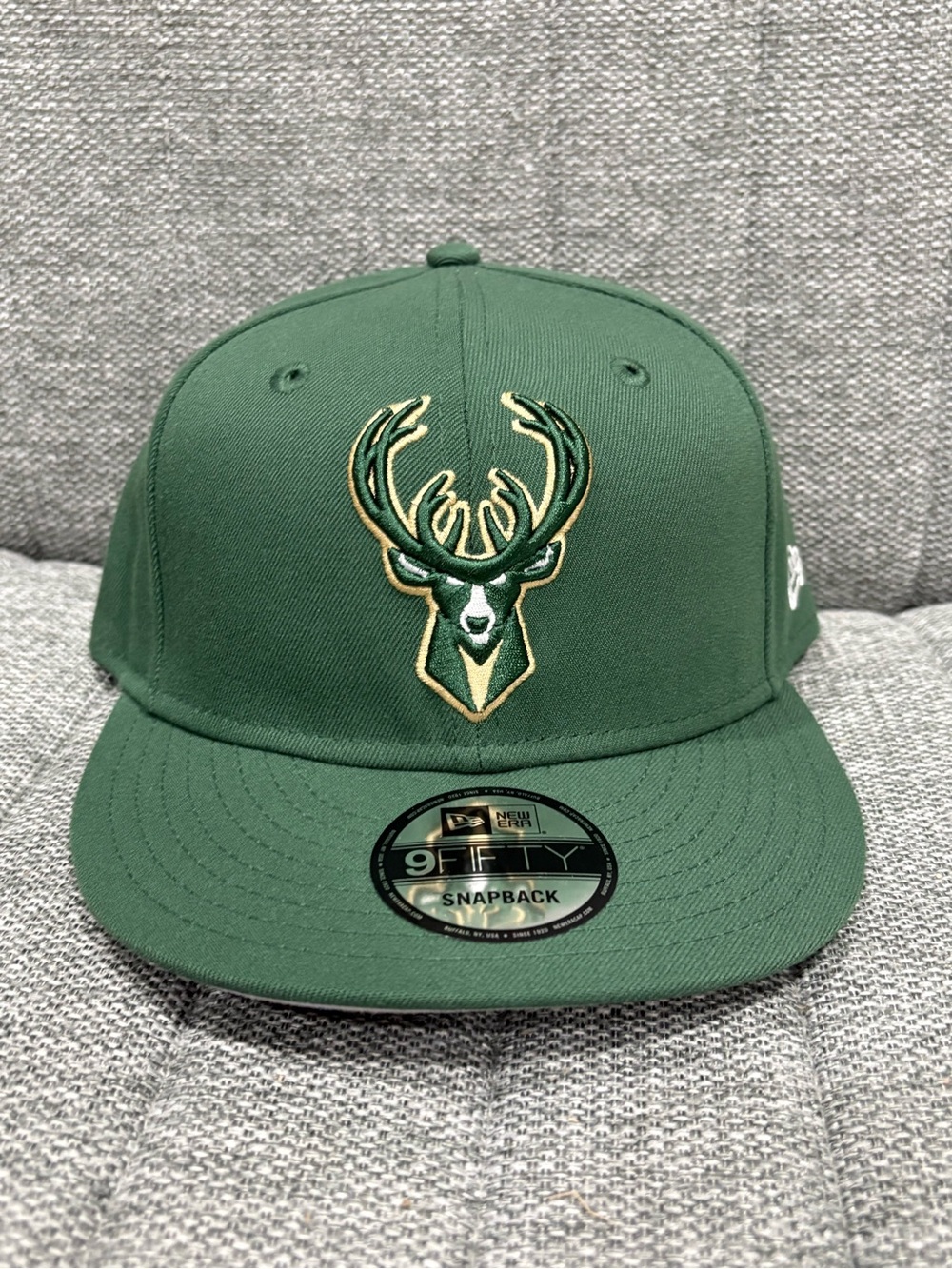 New Era Green Milwaukee Bucks 9FIFTY Snapback Hat with Gold Accent